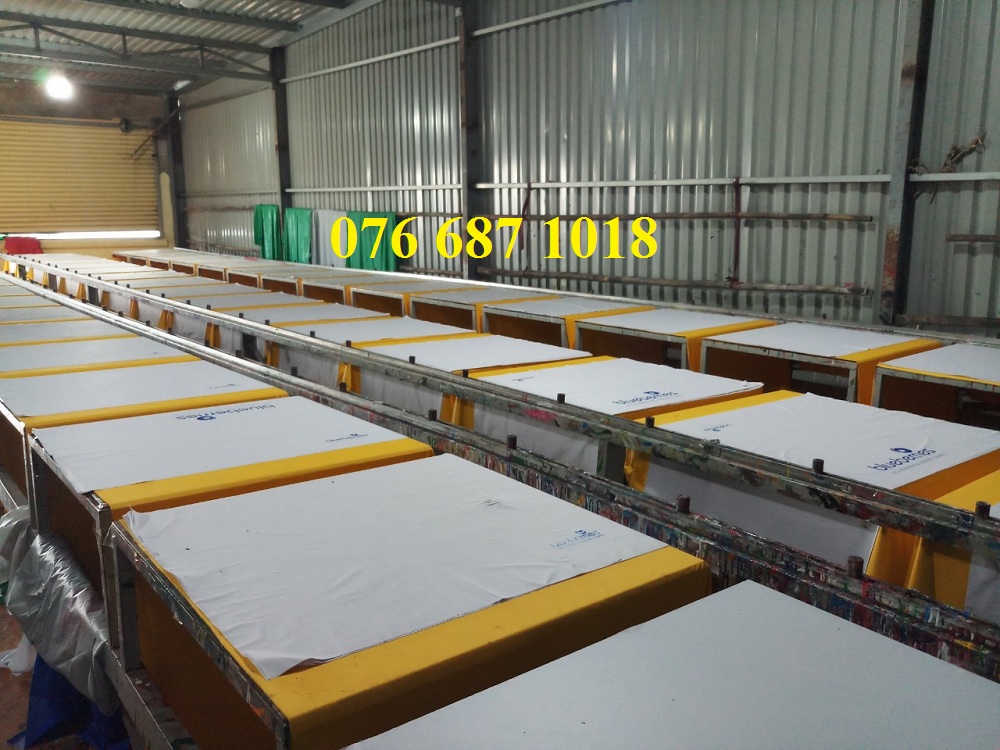 Xưởng in áo mưa nhựa, in áo mưa cánh dơi